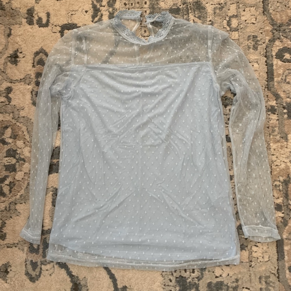 Light blue top